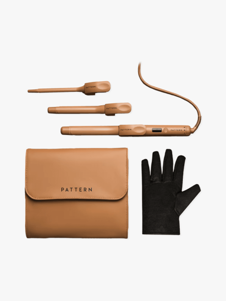 Pattern Beauty Interchangeable Curling Iron in warm brown color way with additional accessories and pouch on light gray background